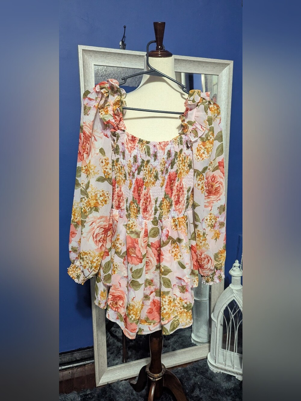 Privy Pink Floral Smocked Long-Sleeve Romper.